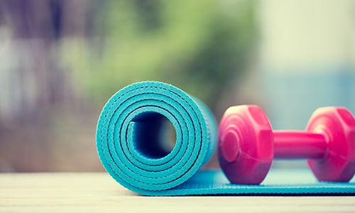 yoga mat and dumbbell