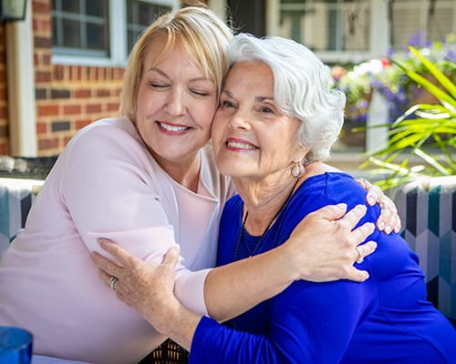 caregiver serving meal