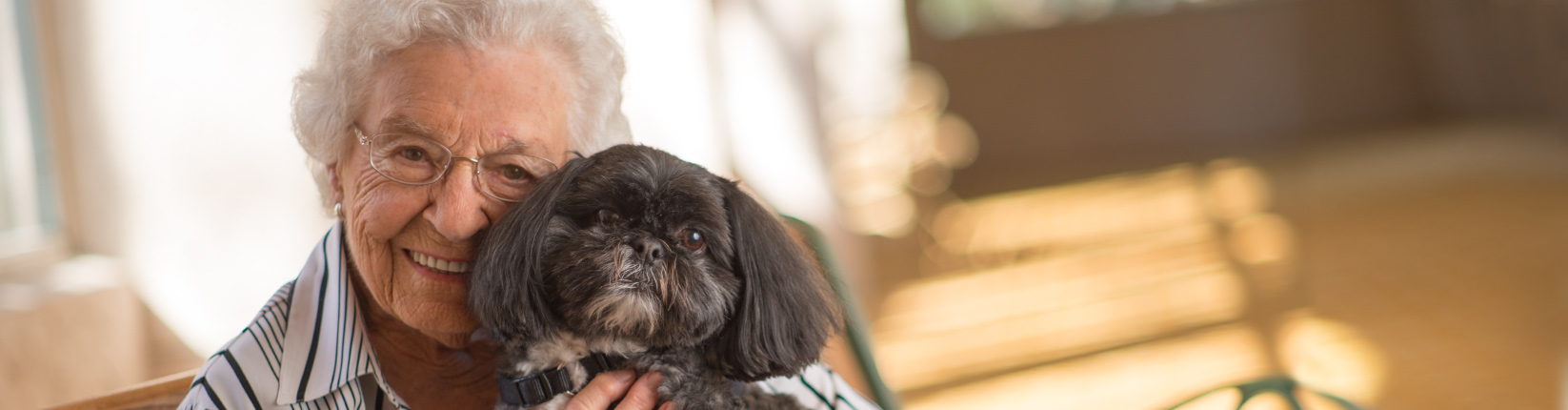 Woman Hugging Dog