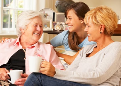 Senior with family members