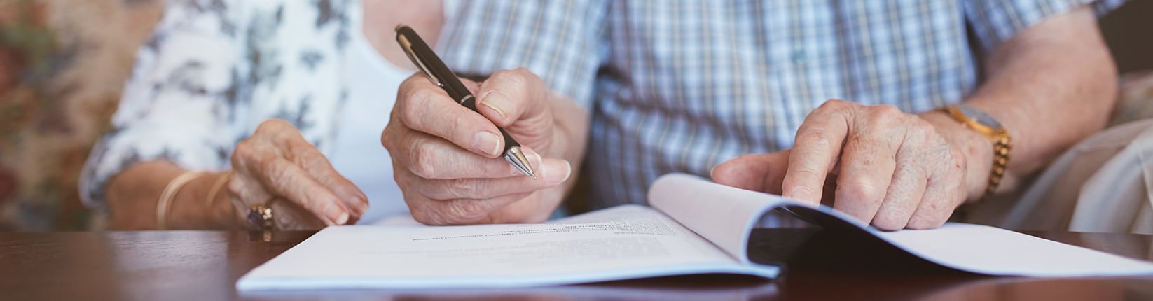 couple filling out paperwork
