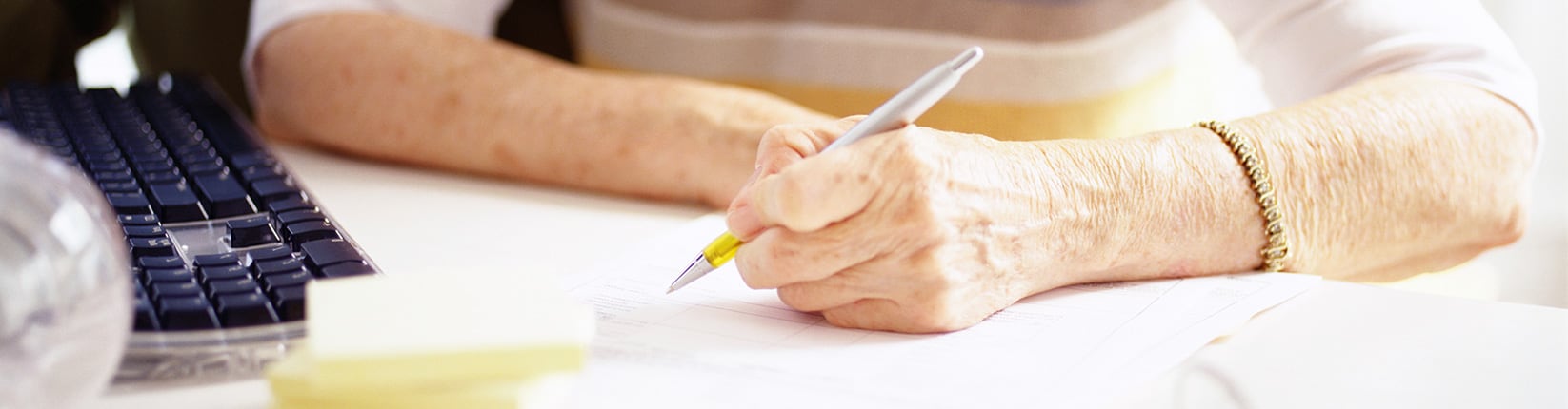 woman looking over finances