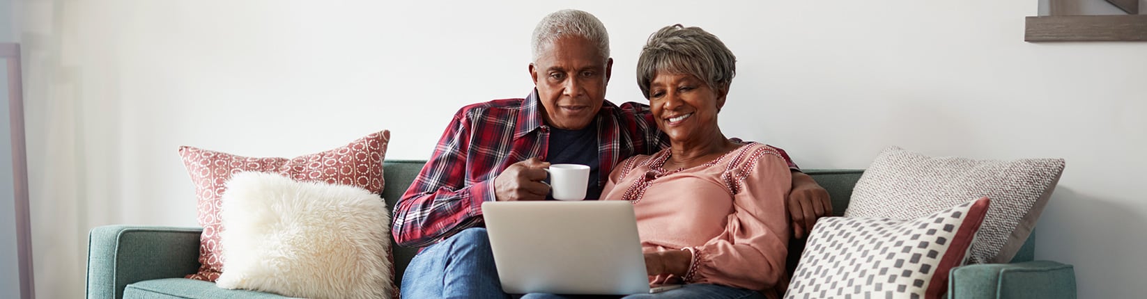 couple smiling on couch