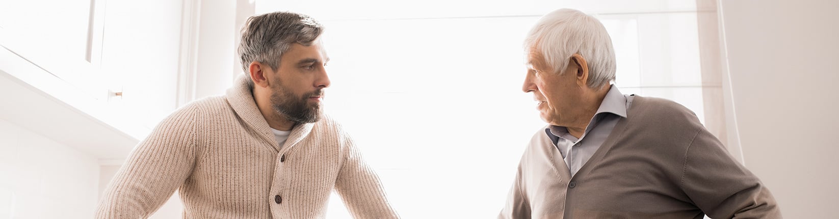 father and son conversation in the kitchen