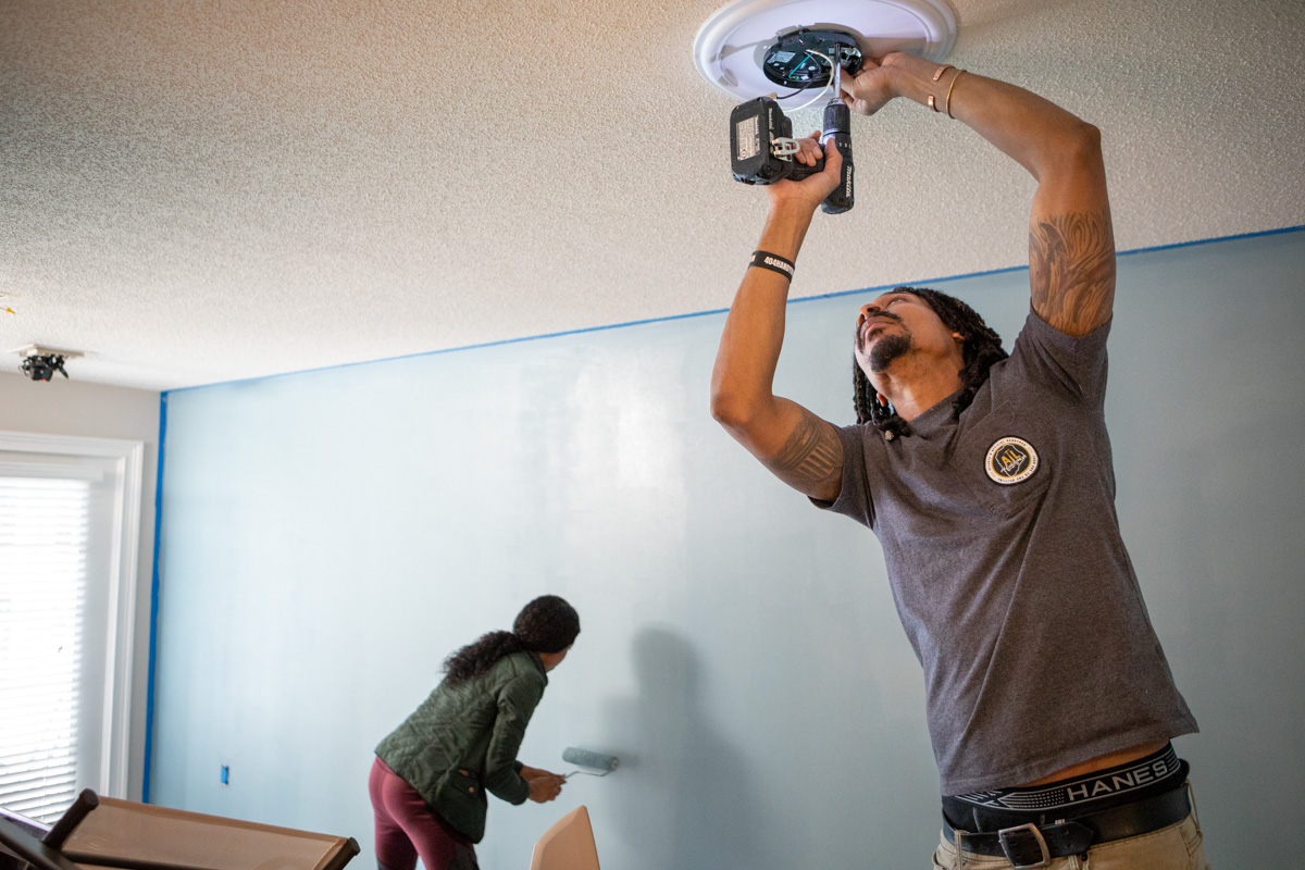  Team member working on ceiling