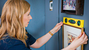  Team member checking if photo is balanced