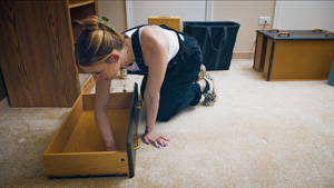  Team member putting drawer together.
