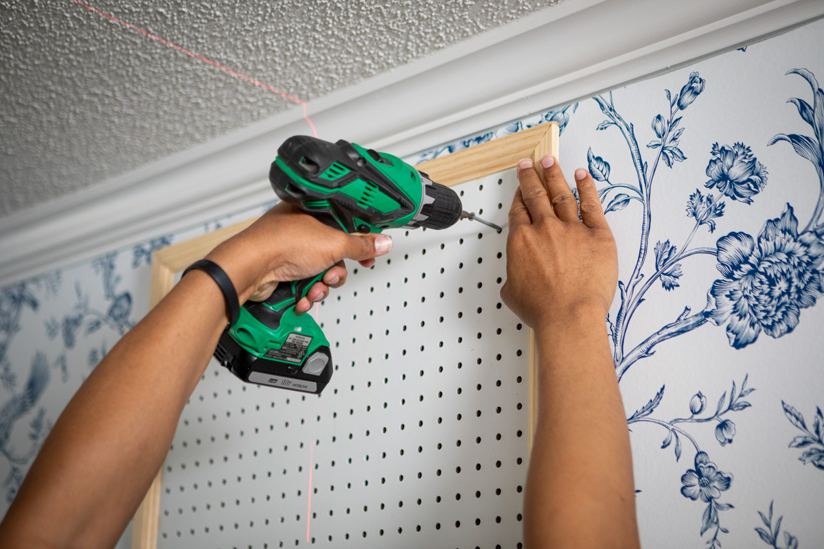  Designer using power drill