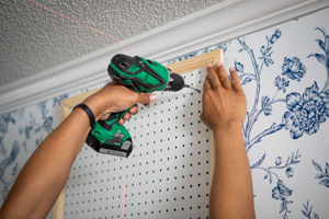  Designer using power drill